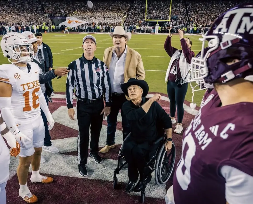 Lone Star Showdown coin toss with Cotton Holdings founder and co-CEO Pete Bell and Texas Governor Greg Abbott at the coin toss at the Lone Star Showdown. (Photo courtesy of Cotton Holdings) 