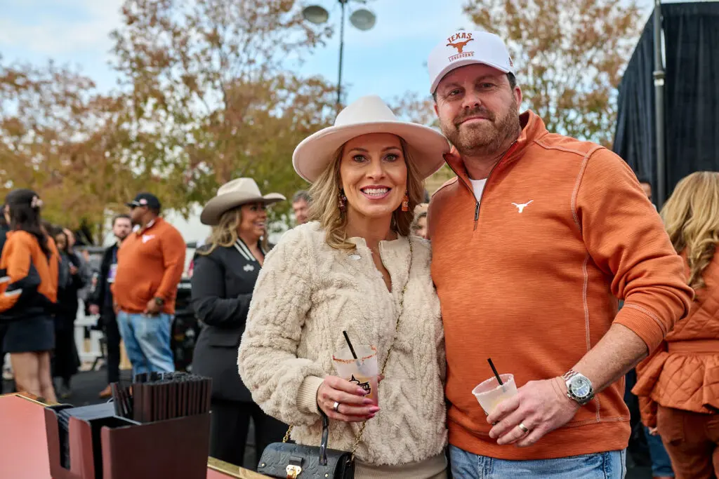 Cynthia & Heath Bratton at Cotton Holdings' tailgate party at the Lone Star Showdown. (Photo courtesy of Cotton Holdings) 