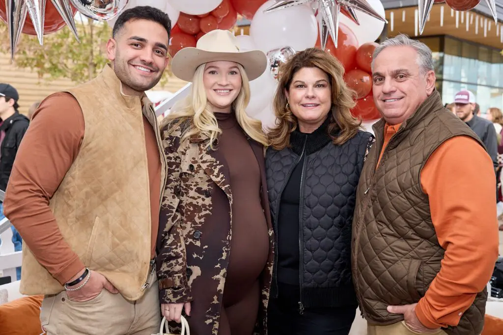 Hayden & Bailey Layne, Kim & Scott Layne at Cotton Holdings' tailgate party at the Lone Star Showdown. (Photo courtesy of Cotton Holdings) 