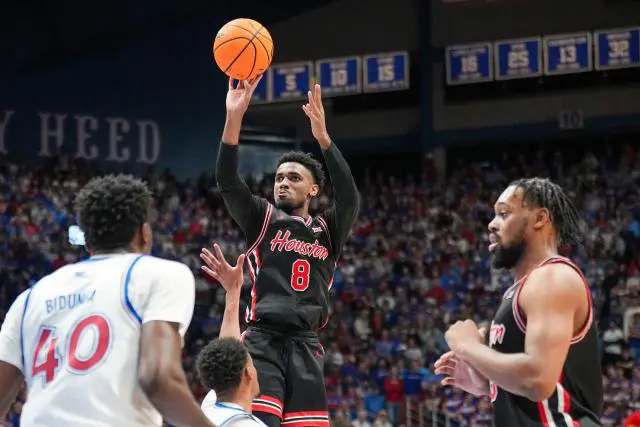 Mylik Wilson hit the 3-point shot that kept the University of Houston alive in its remarkable 92-86 win at Kansas.
