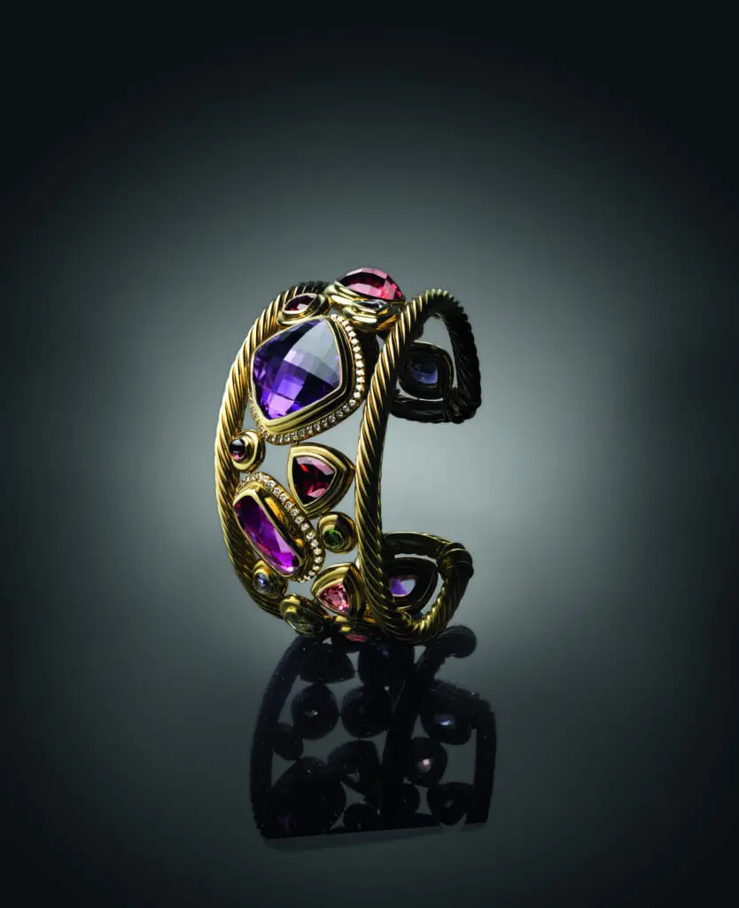 25th Anniversary Mosaic cuff with garnet, pink tourmaline, peridot, and pavé-set diamonds, 2011. (Photo by Raymond Meier)