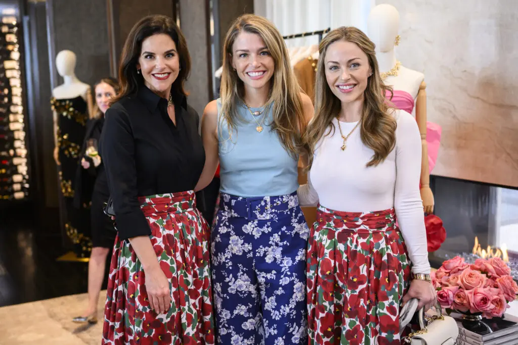 Ann Ayre, Brittany Sakowitz, Lexi Sakowitz Marek all wearing Carolina at the cocktail event in the penthouse suite at The Post Oak Hotel (Photo by Michelle Watson, CatchLightGroup.com)