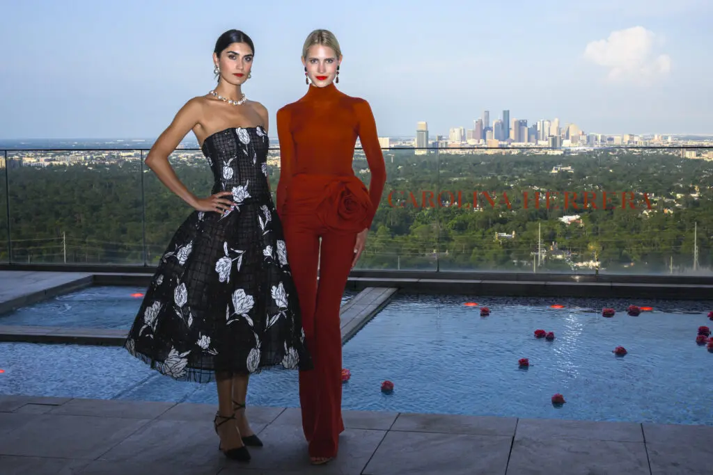 Models aide the pool on the terrace of the penthouse suite at The Post Oak Hotel awash in roses for the Carolina Herrera fête (Photo by Michelle Watson, CatchlightGroup.com)