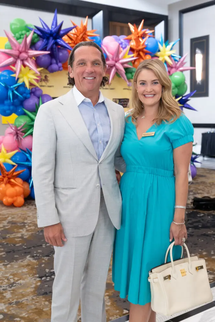 Houston Children's Charity patrons and 2025 gala chairs Tony & Frances Buzbee attend the Chariots for Children van giveaway. 