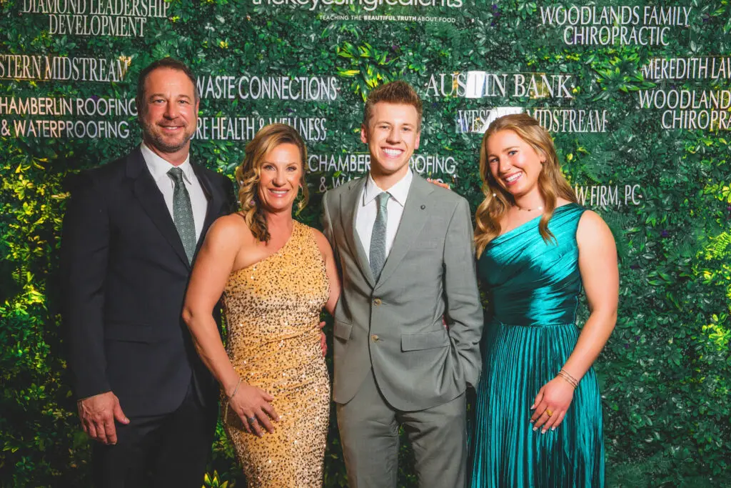 The Keyes family — Kevin, Michelle, Carson and Isabella — gathers during The Keyes Ingredients Reaching New Heights gala at The Peach Orchard. (Photo courtesy SpryArt Photography)