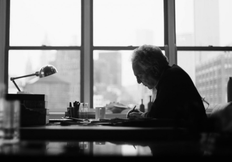 David Yurman sketching at desk.