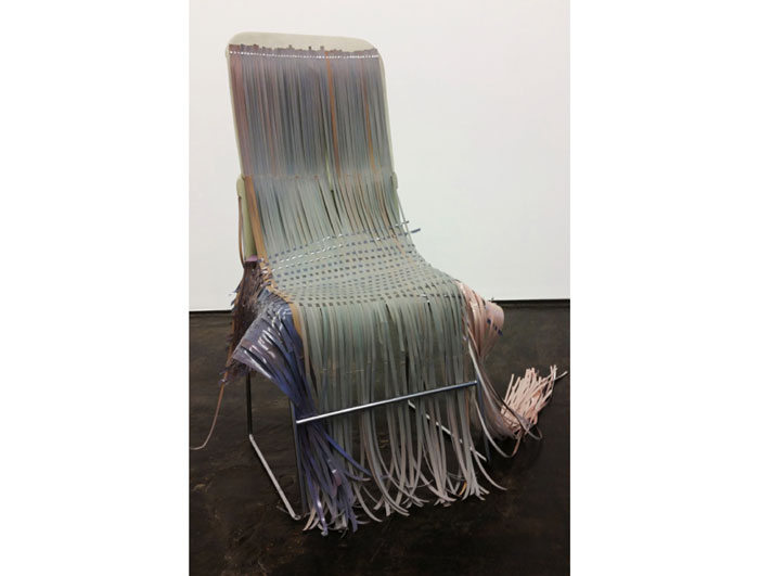 Jillian Conrad's "Slipped Cover," 2015, at Devin Borden Gallery, typifies the conceptual focus of the Houston-based former Core Fellow (through July 25). This sculpture offers a surprising take on a plastic and chrome chair encased in woven photography paper.