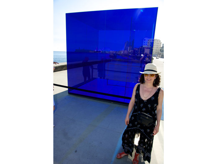 Viewing art on the Malecón, a seawall along a stretch of the Havana coastline