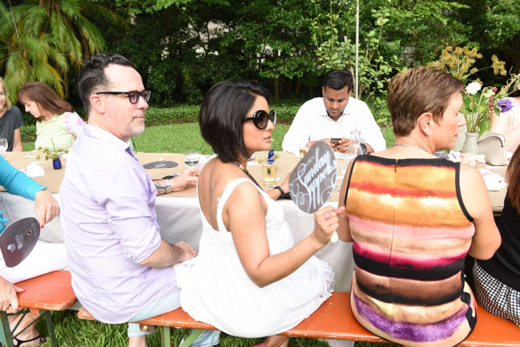James Brock, left, Angela Shah, Chari-Beth Rose White, and Aashish Shah (background) at the table.