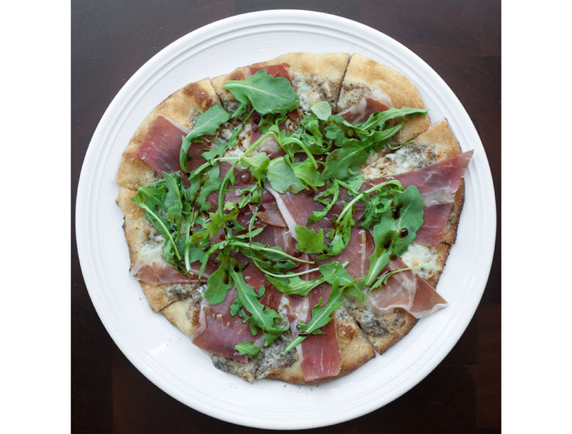 Enjoy a pizza and a pint of beer or wine for just $18 at Radio Milano. 
