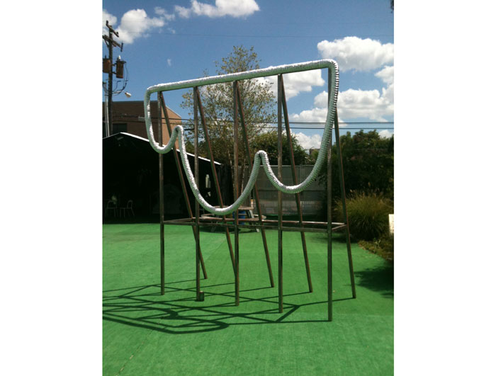 Patrick Renner's witty, succinct sculpture "Silver Anniversary," 2015, holds court  In the gallery's outdoor performance area.