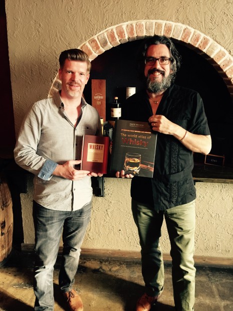 Mike Raymond, left, and Dave Broom talk whisky at Reserve 101.