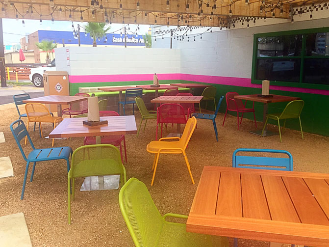 Dine al fresco on Velvet Taco's colorful outdoor patio. 