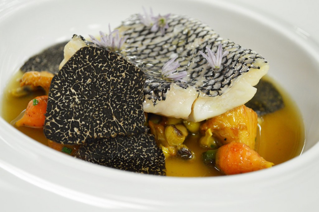 Black bass with chanterelle, Australian truffle and chive blossom