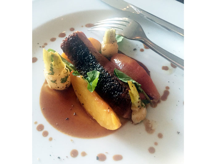 Table's peach glazed duck will satisfy everyone. It's served with Texas peaches, baby turnips and potato purée. 