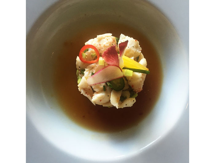 Table on Post Oak's colossal lump crab salad serves as a first-course option on both the lunch and dinner menu. It is served with black radish, avocado, cilantro, jalepeños and citrus dressing. 