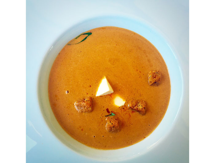 Lobster bisque is on Table's brunch menu. Bisque, smoked mozzarella and sundried tomato oil espelette croutons
