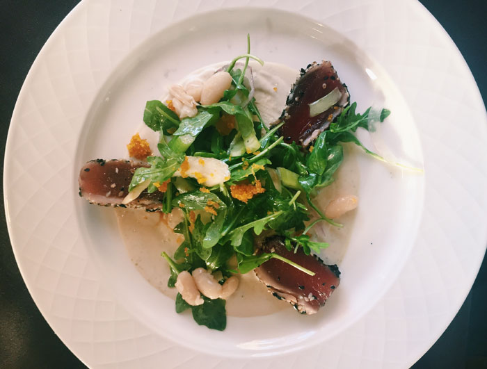 Tonno e Bottarga is on the Sardegna at Arcodoro. Seared and marinated Ahi tuna, red onions, rucola, celery, cannellini beans, bottarga shavings with a bottarga sauce. 