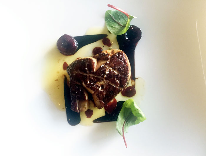 Seared foi gras is another first-course menu option at Table, served with cherry jubilee and soy gastric. 