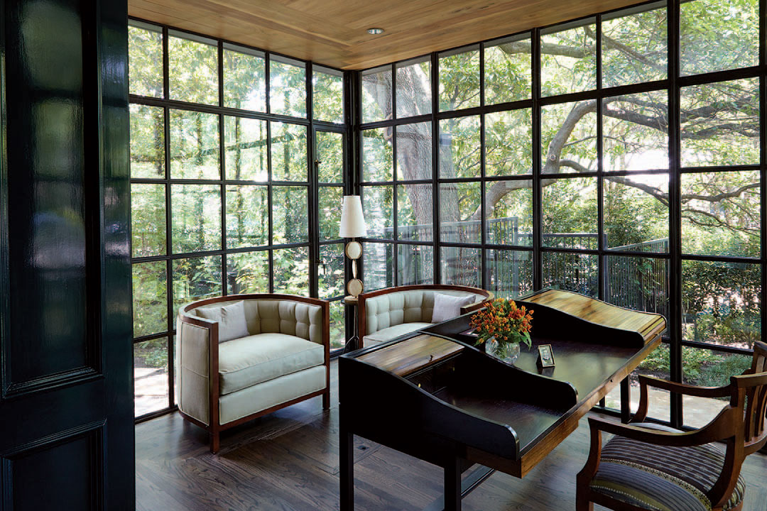 The study has European walnut ceilings and a rare double roll top desk designed by designer Edward Wormley for Dunbar, which belonged to the husband’s father in New Orleans.