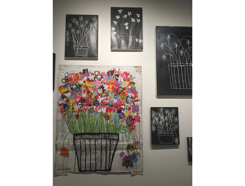 In its booth, Koelsch Gallery of Houston focused solely on Texas-born, Memphis-based painter Tad Lauritzen Wright. Wright's outsider-styled canvases garnered sales and interest