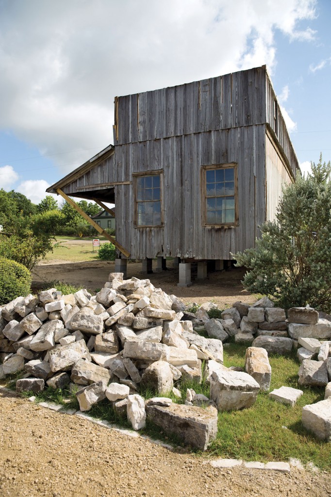 A 1890s house Massey
relocated to Rummel Square from New Ulm. The roof was cut off so that the house could fi t under power lines.