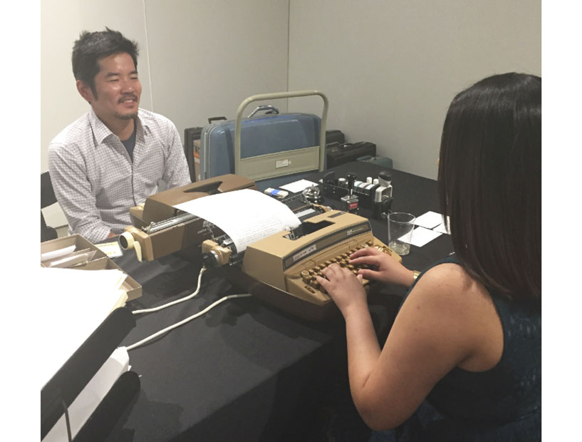 Mat Kubo and my colleague Nancy Gutierrez enact a performance at the Art League installation. 