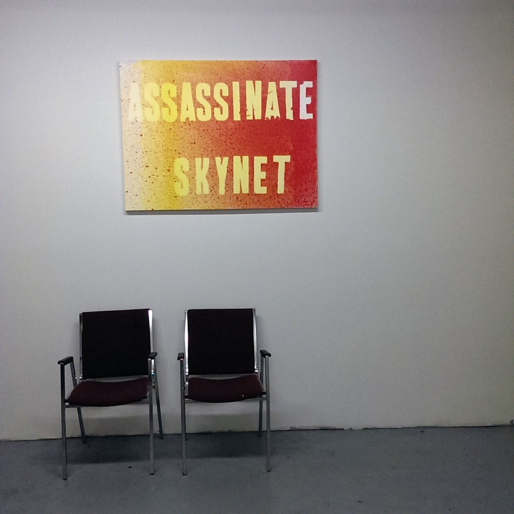 At Cardoza Fine Art, 1320 Nance, the former stage of Atomic Cafe Theater is reportedly haunted by the ghost of Dan Treadway, a late talent who often graced the warehouse performance space. Shown: a canvas by Houston’s own Mark Flood. (Photo by Matthew Ramirez)