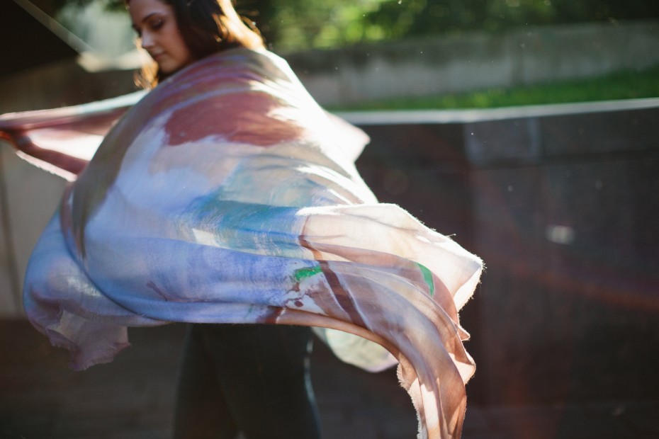 Manoosh co-founder Anna Wilson twirls with a scarf from the fall 2015 collection.