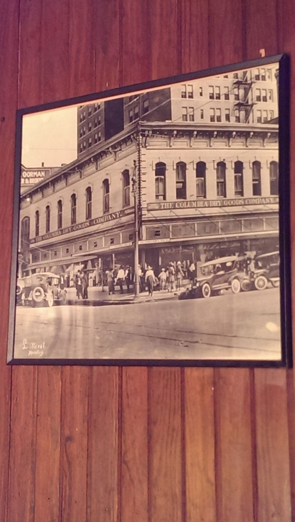 A vintage photo of the Columbia Dry Goods Company hangs in The Spaghetti Warehouse. (Photo by Matthew Ramirez)