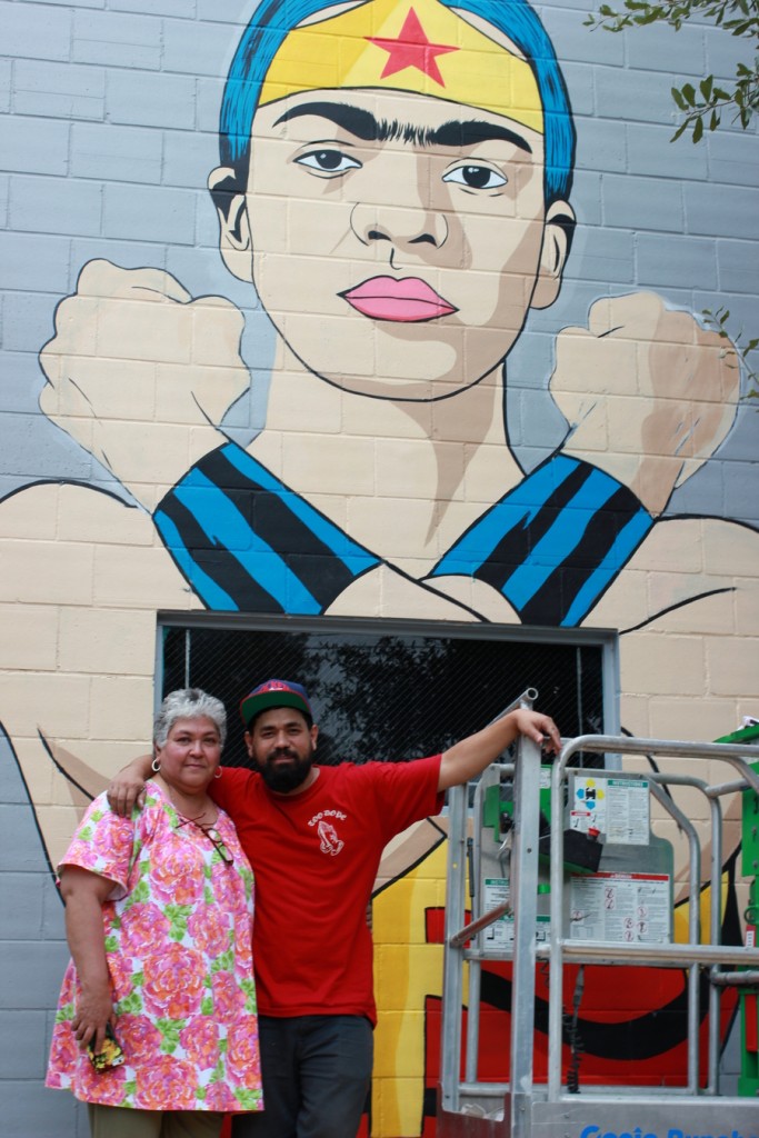 Donkeeboy with his mother, Sylvia Roman, the artist from whom he draws inspiration. (300 N. York St.)