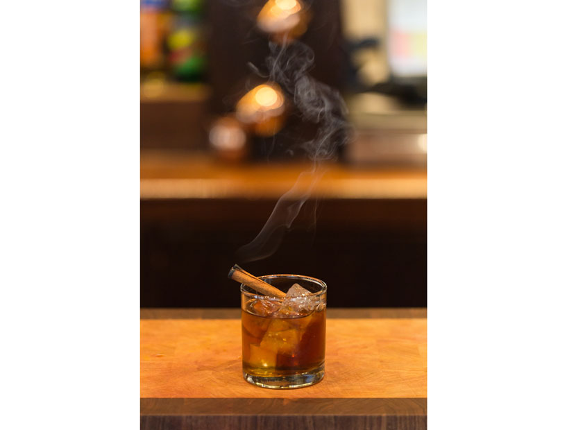 Grab a smokin' cocktail at Radio Milano's newly renovated bar. (Photo courtesy Radio Milano)