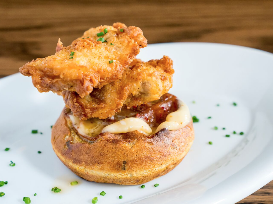Paul's Kitchen offers a twist on classic chicken and waffles by substituting chicken for quail. (Photo by Gary Wise)