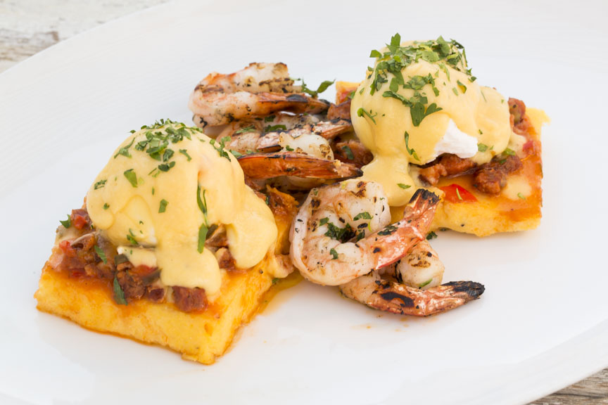 The shrimp and creamy polenta is topped with a poach egg, hollandaise sauce and a sausage ragu. 