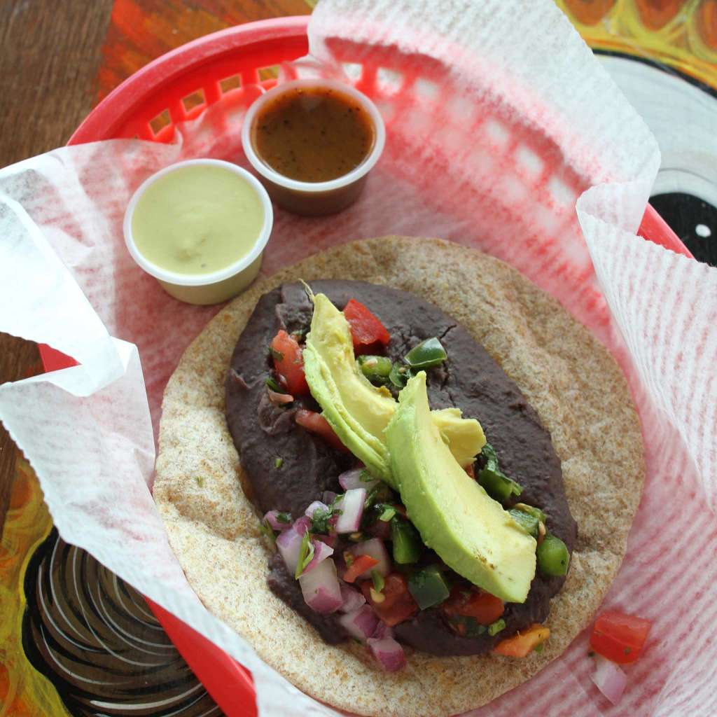 For the vegan — Tacodeli's Freakin Vegan: organic refried black beans, avocado and pico de gallo. 