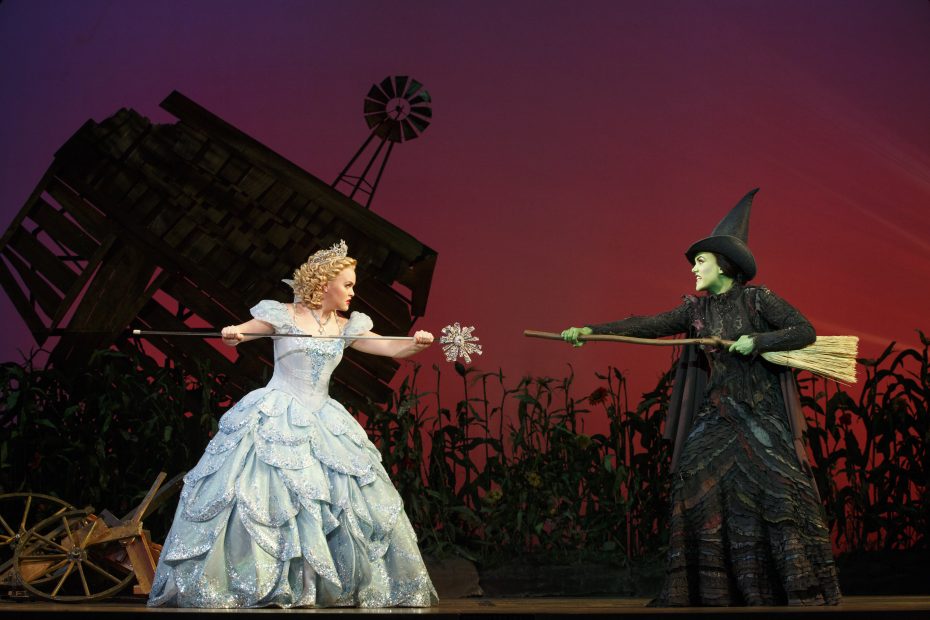 A tense moment between Glinda (Amanda Jane Cooper) and Elphaba (Emily Koch) in the 2016 national tour of the musical “Wicked.” Photo by Joan Marcus.