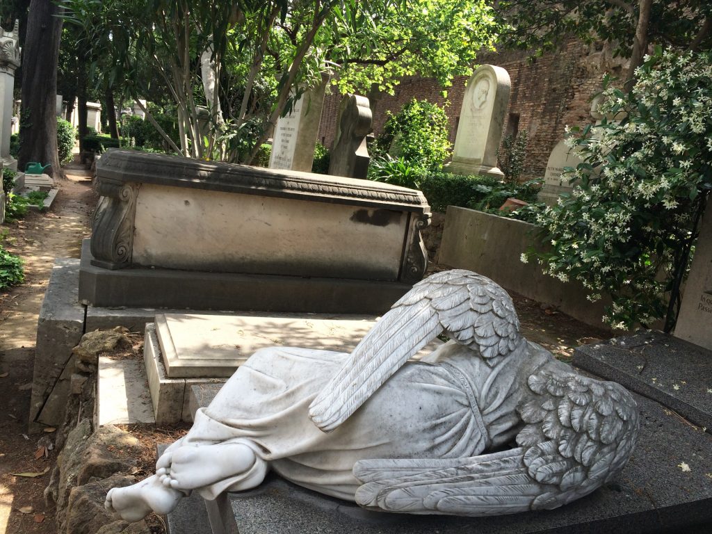 A fallen angel reposes in Rome's Non-Catholic Cemetery, a final resting spot for many immortal talents. 