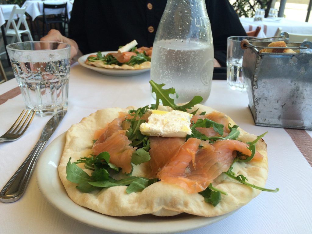 Lunch in Testaccio: pizza with smoked salmon, arugula and goat cheese.