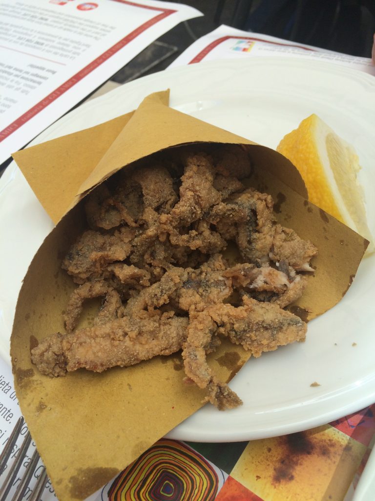 Paper cone of fried anchovies, among the succulent offerings at Rome's Trattoria de Gli Amici.