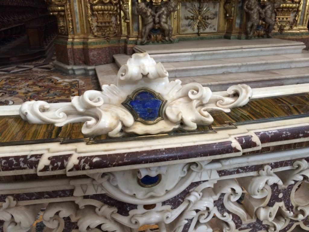Details in the church; carved marble inlaid with lapis.