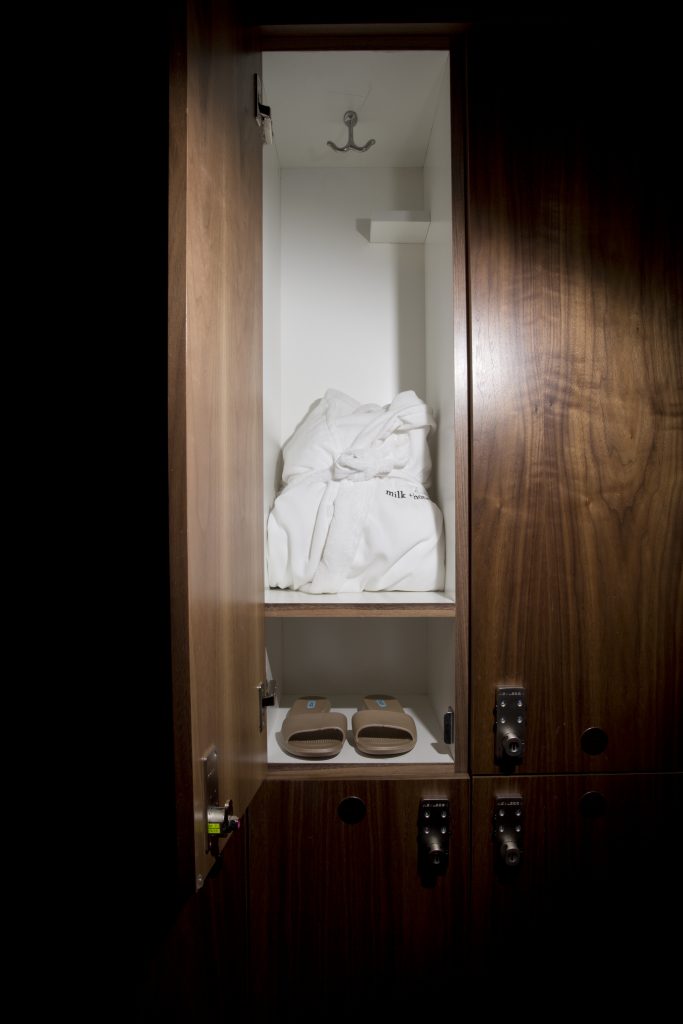 Slip into your Milk + Honey robe and slippers in the locker room.