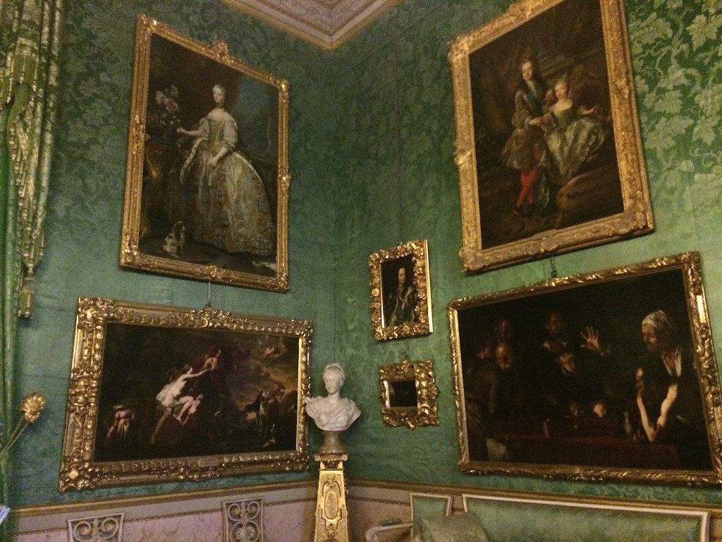 A change in wall color and more intimate portraits on the walls.