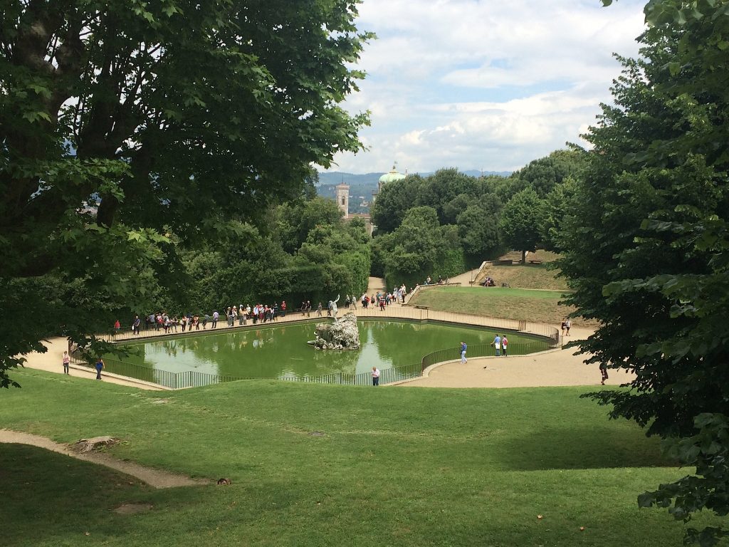 Climbing ever higher and looking back at the fishpond with a statue of Neptune at its center.