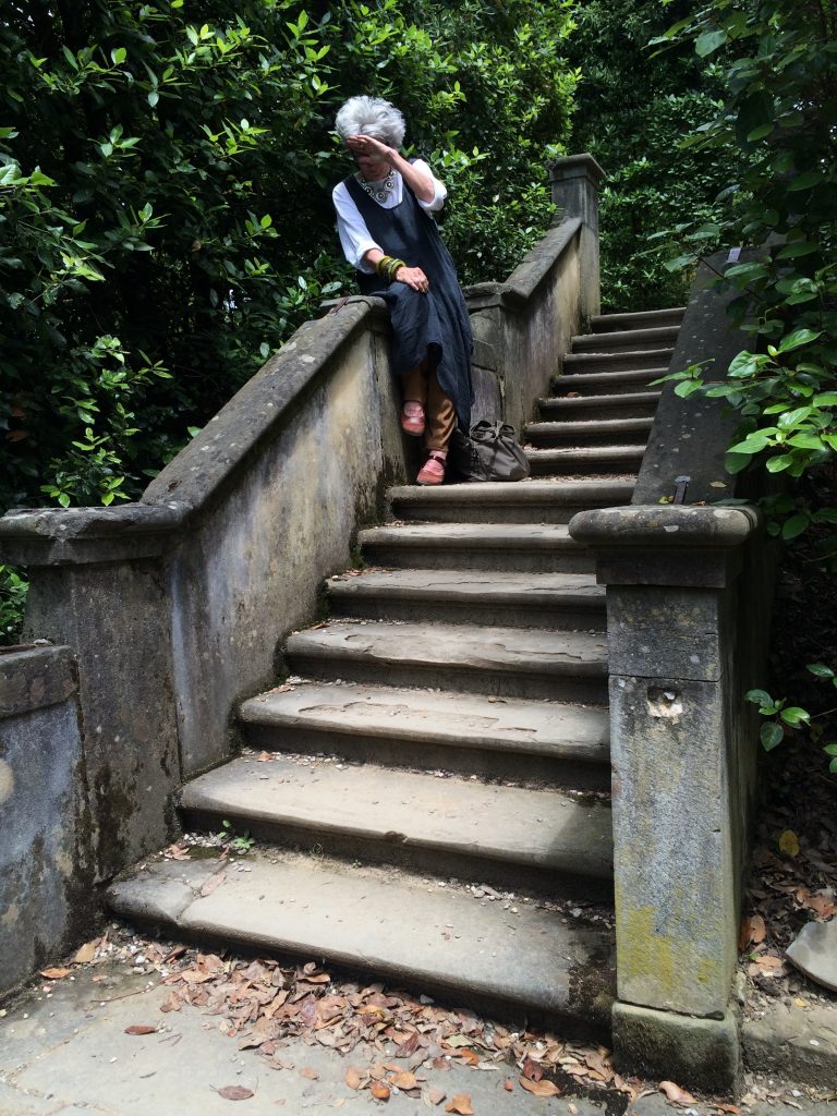Mary Margaret Hansen striking a pose on a secluded stairway in Bobli Gardens.