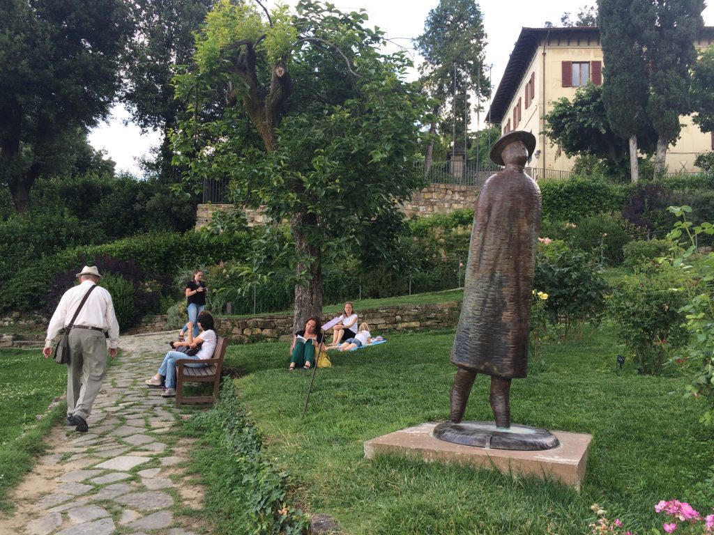 Bronze sculpture by artist Folon in this hillside rose garden.