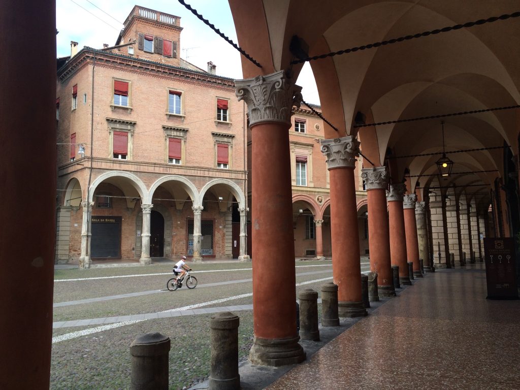 On a stroll under an arcade in the old city center.