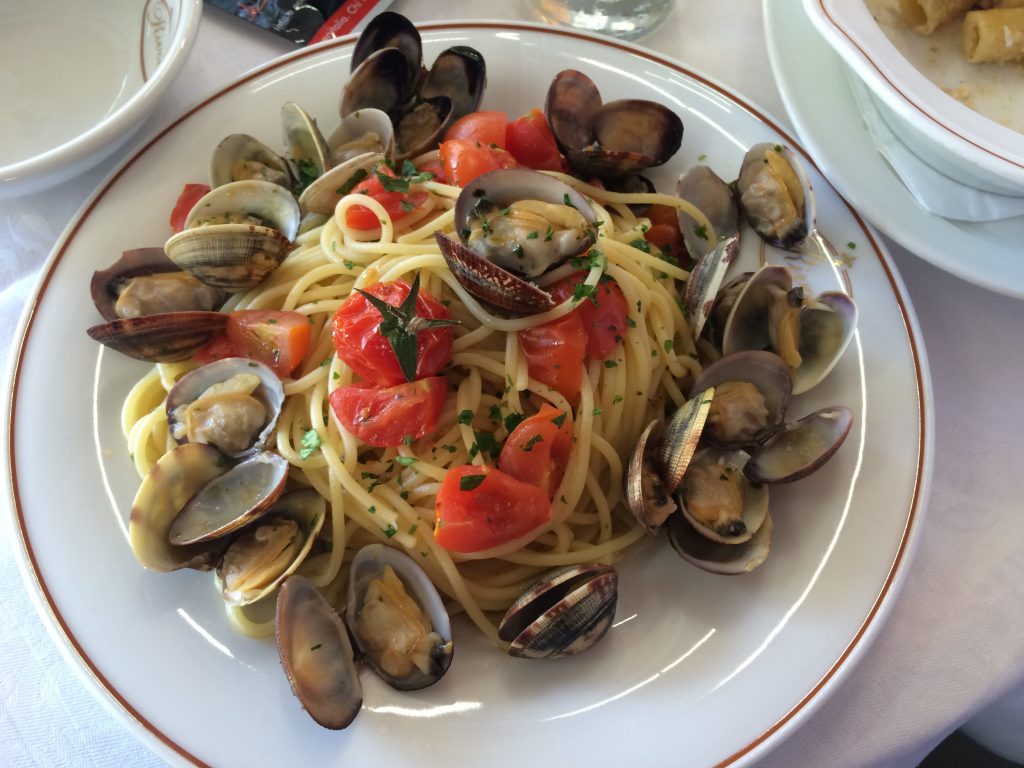 Eating spaghetti vongole as memories of the Uffizi's painted ceilings drift through my mind.