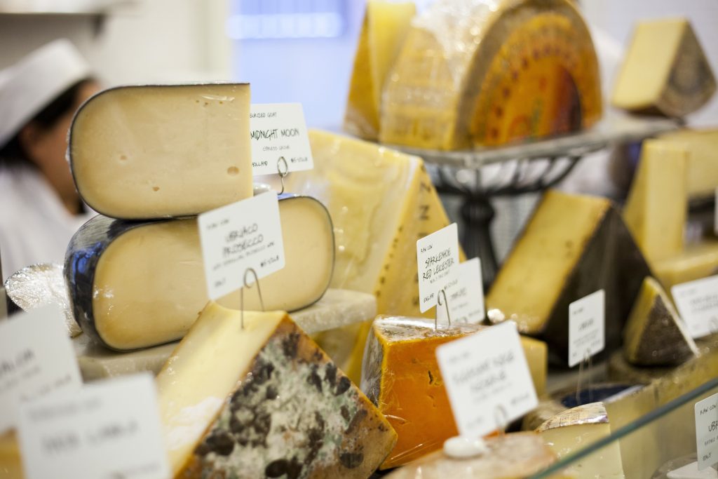 A selection of the grocer's Brie and cheeses
