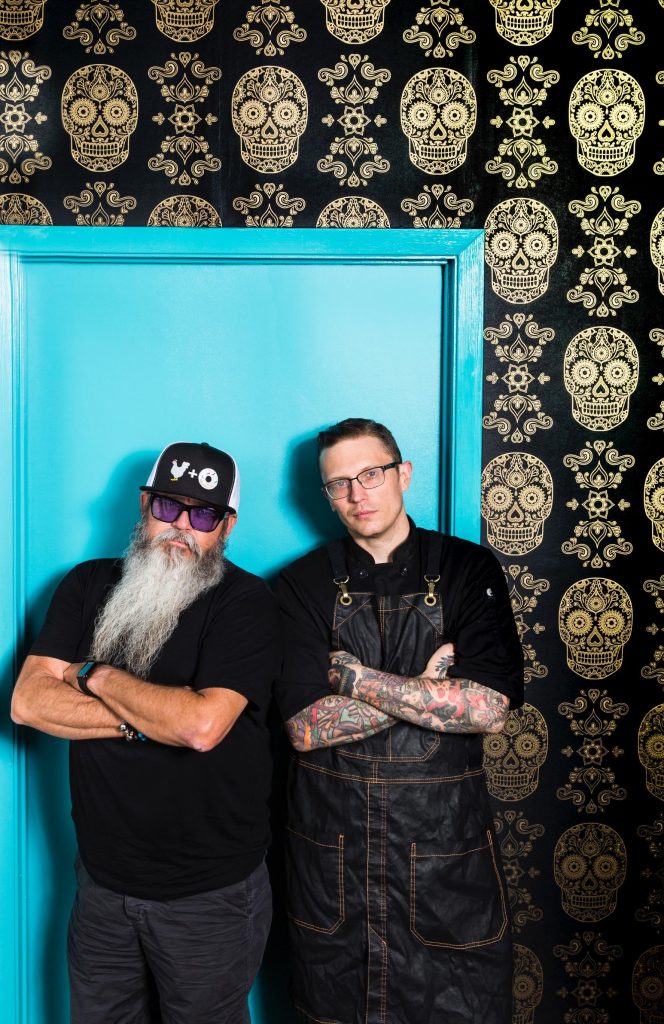 Restaurateur Lee Ellis and partner Anthony Calleo stand in the new Pi Pizza — a 2,000 sqaure-foot space designed by Austin architects Ellis and Kevin Stewart. 