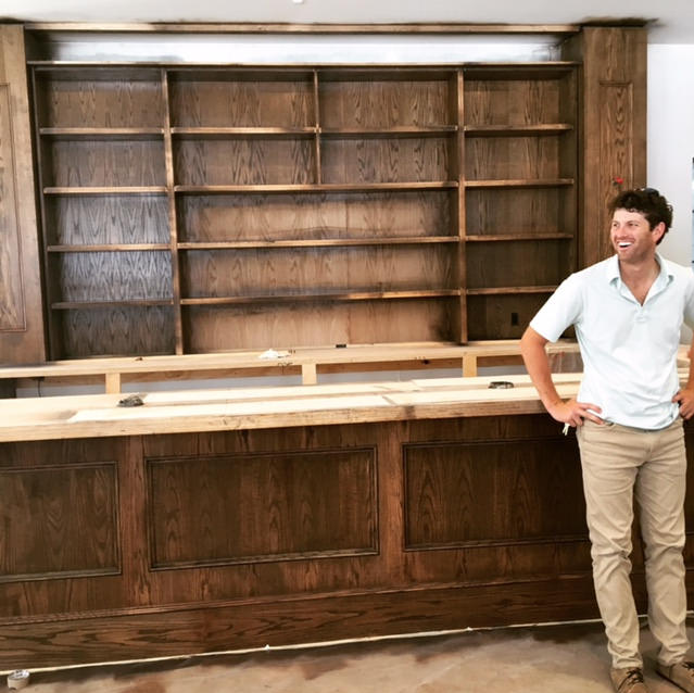 Nick Adair admires the nearly completed bar at Eloise Nichols. 